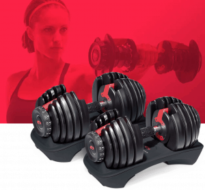a pair of selecttech 552s with a fitness model lifting weights in the background